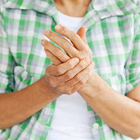 What are some of the most common symptoms of rheumatoid arthritis?